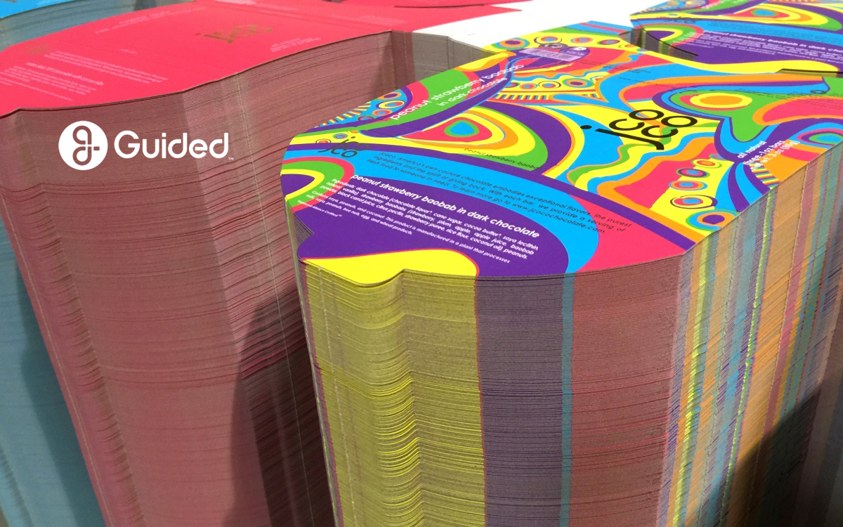 Guided: stacks of vibrantly printed custom packaging